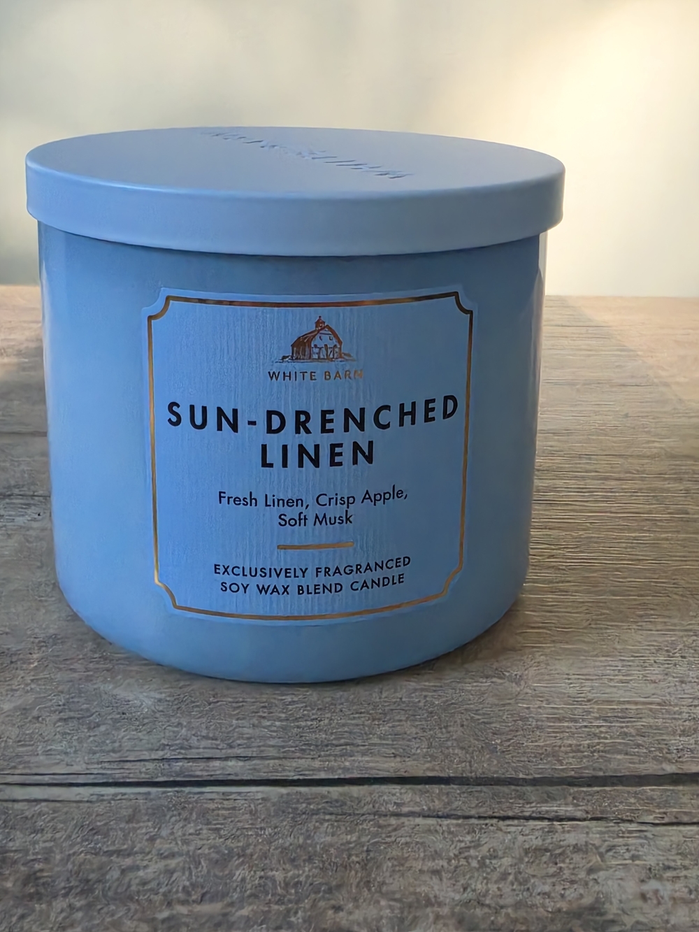 White Barn Sun-Drenched Linen Light Blue Candle with Gold Accents